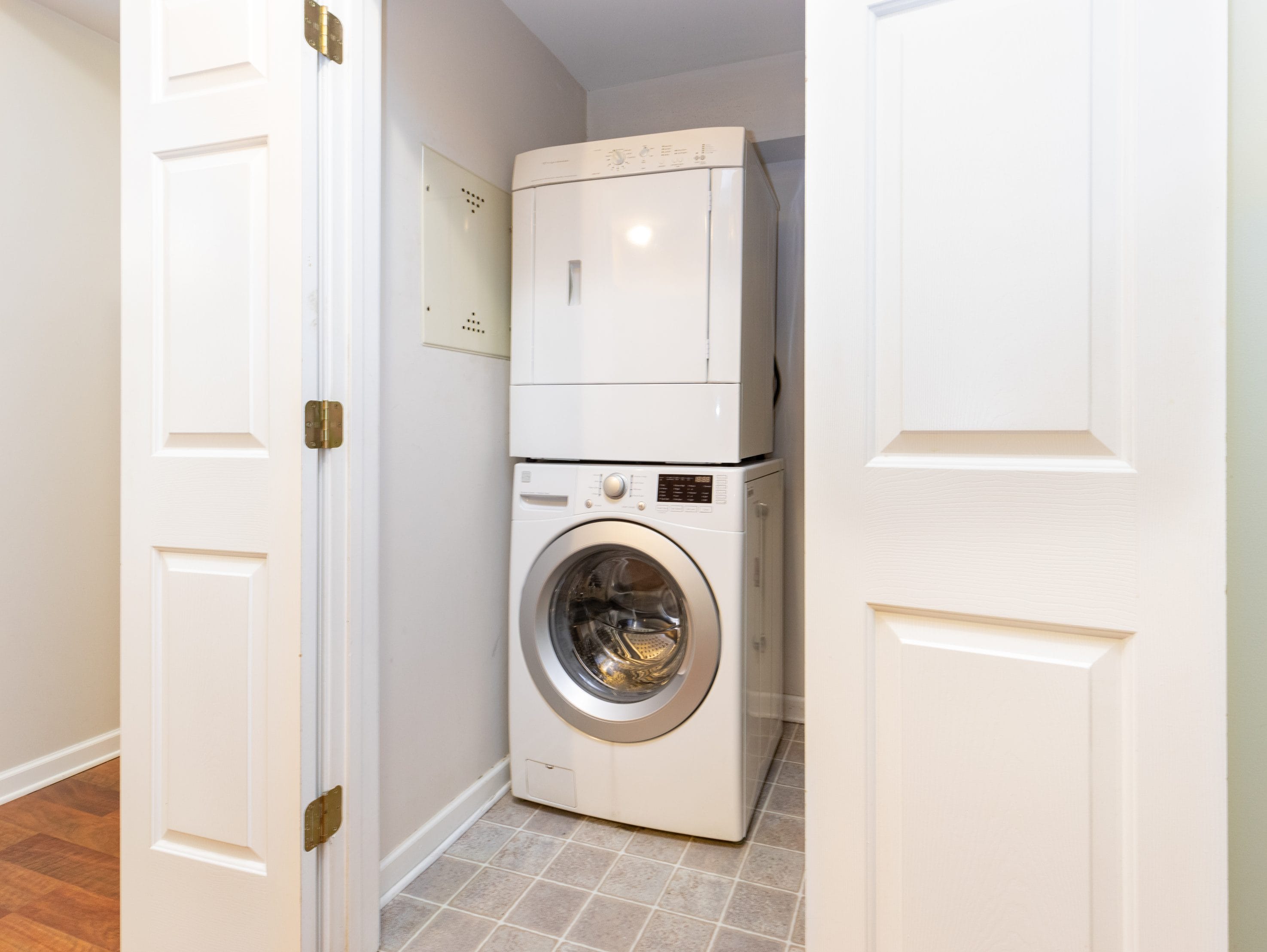 A stock image of a washer and dryer. Dryer vent cleaning is a critical part of home maintenance and safety.